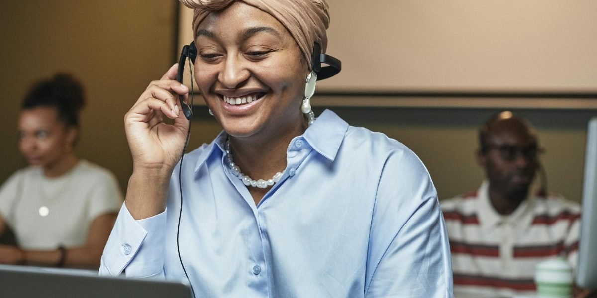 Support team member answering an email in a calm office