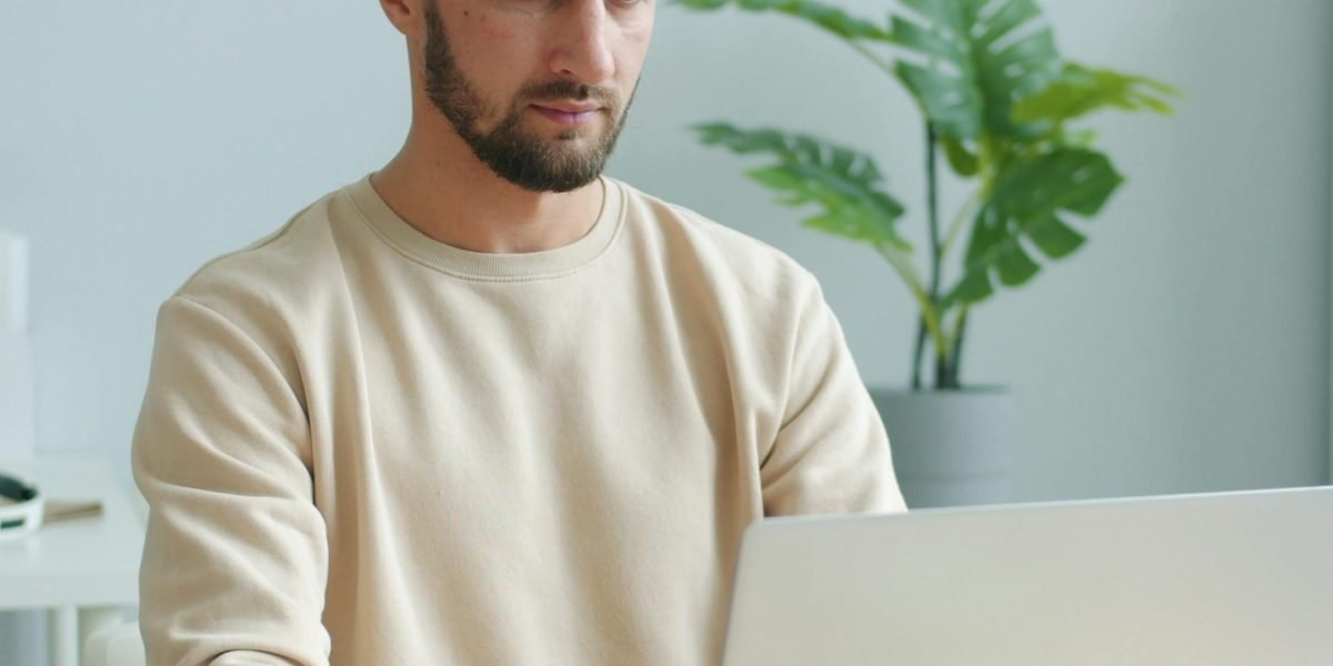 Reader viewing a mental health article on a laptop