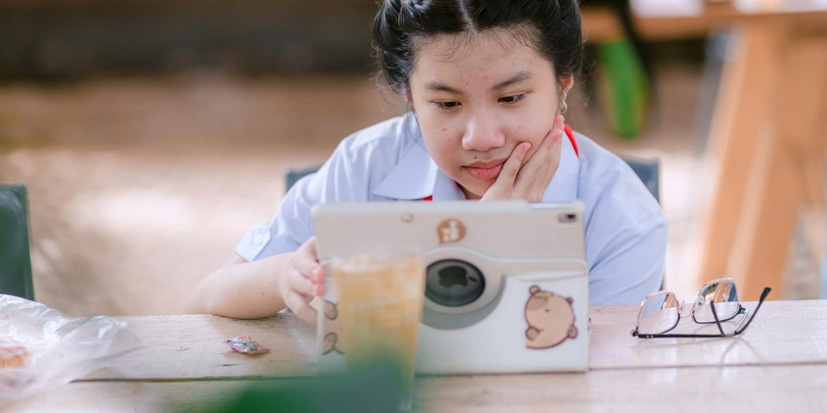 An individual confidently researching healthcare provider credentials on a tablet, promoting informed decisions.