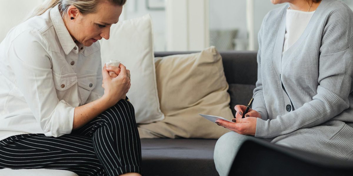 A person consulting with a mental health professional, emphasizing the importance of accurate diagnosis and guidance.