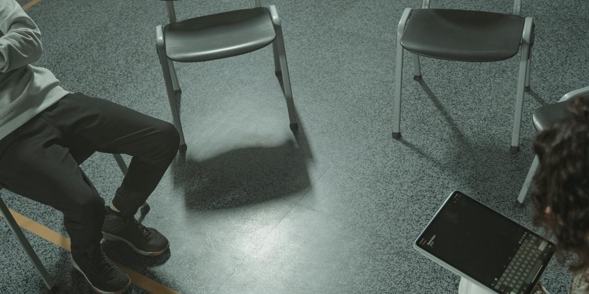 Individuals participating in a support group, showing mutual understanding and shared experiences, crucial for coping with STPD.