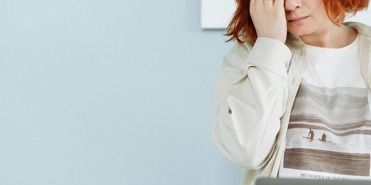 High functioning depression often manifests as an individual performing well professionally despite experiencing inner exhaustion and sadness.