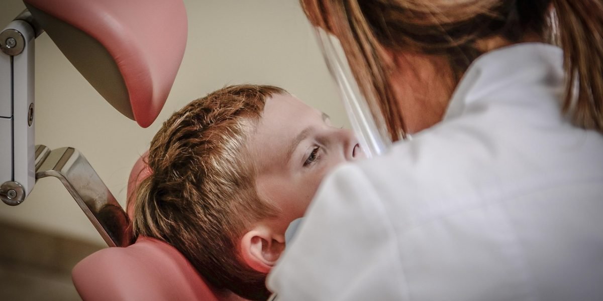 A patient having a discussion with a healthcare provider during a psychiatric evaluation.