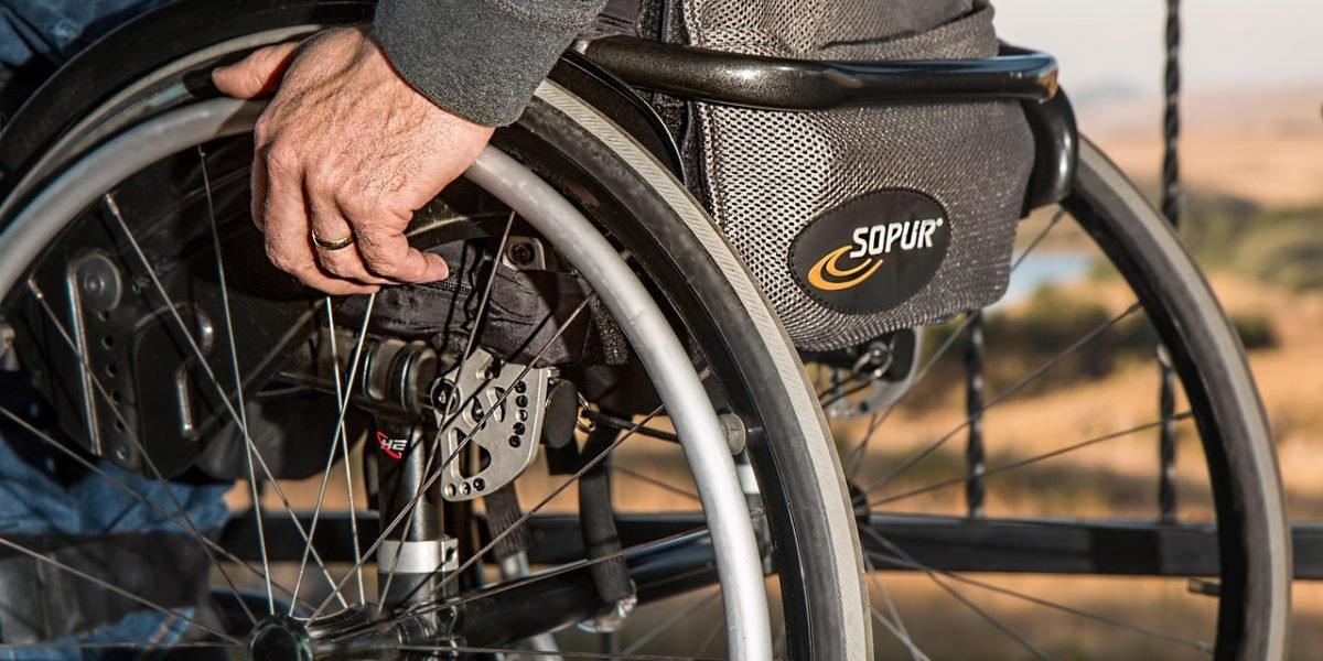 A patient and healthcare professional discuss and plan for ongoing care after discharge.