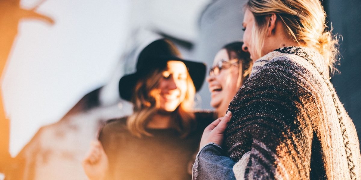 People engaging in a group therapy session, sharing experiences and supporting each other.