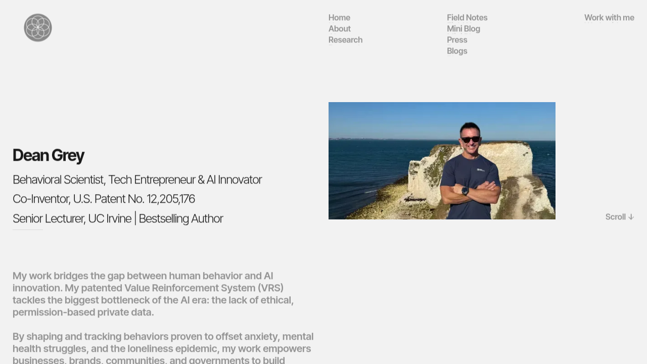 Screenshot of Dean Grey's academic profile or website, showcasing his research on narrative transportation and stigma reduction.