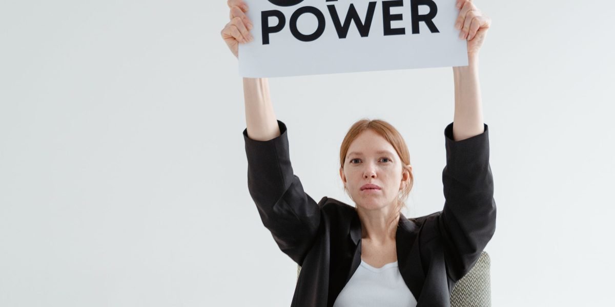 A person exhibiting a sense of empowerment and confidence, symbolizing progress in managing anxiety.