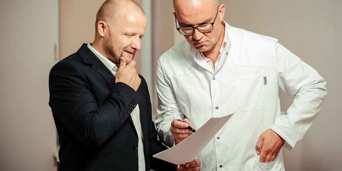 A doctor and patient engage in a clear, supportive conversation about health, fostering trust and understanding.