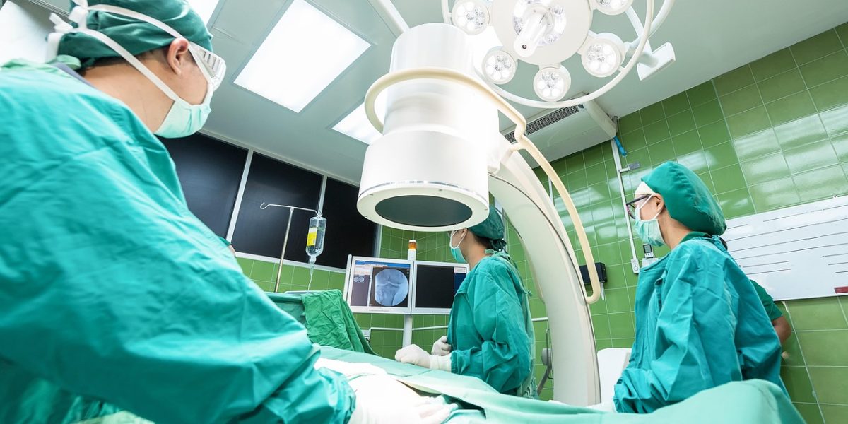 A patient confidently engaging with a healthcare professional, asking for clarification about medical terms.